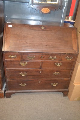 Lot 554 - A George III mahogany bureau of typical form...