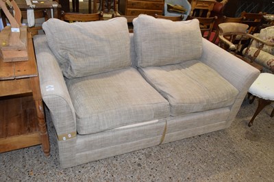 Lot 287 - An oatmeal upholstered sofa bed