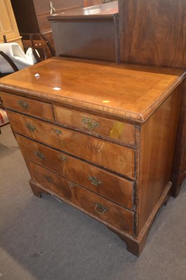 Lot 383 - An 18th Century walnut chest with two short...