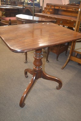 Lot 568 - A late Georgian mahogany tilt top table set on...