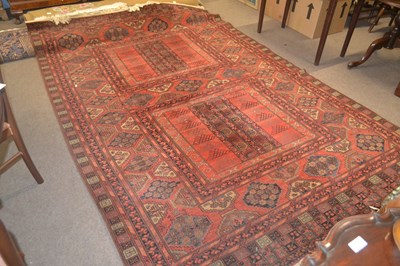 Lot 576 - A large 20th Century Middle Eastern floor rug,...