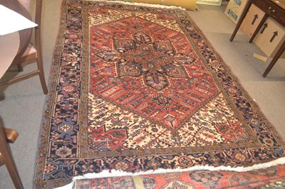 Lot 579 - A large 20th Century Iranian wool floor rug...