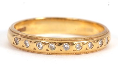 Lot 4 - An 18ct diamond ring, set with nine small...