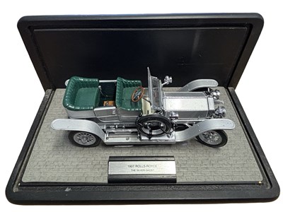 Lot 152 - A pair of cased die-cast scale model cars, to...