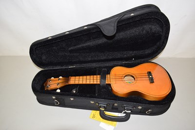 Lot 47 - A ukelele manufactured by Lark, China