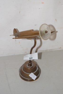 Lot 50 - A brass model of a Spitfire on stepped brass base