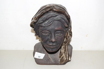 Lot 56 - A pottery model of a girls head