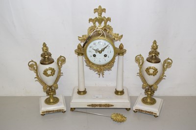 Lot 71 - A clock garniture with alabaster vases and...
