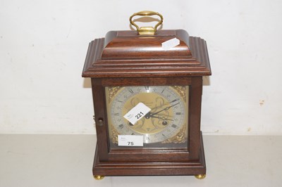 Lot 75 - A mantel clock in wooden case with silvered...