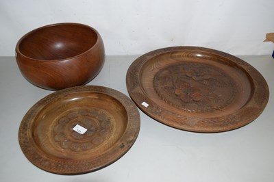 Lot 153 - A large wooden carved charger with floral...