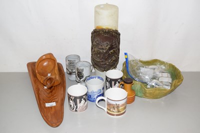 Lot 182 - Two carved wooden dishes and large candle...
