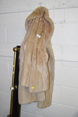 Lot 214 - A vintage fur coat with label for Dickins &...