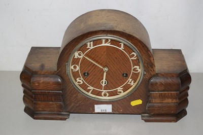 Lot 515 - A wooden mantel clock