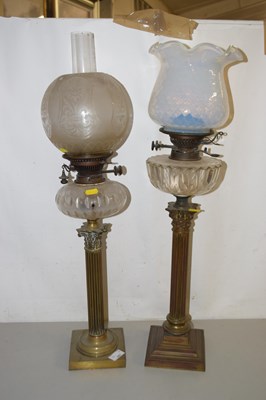 Lot 567 - A pair of oil lamps