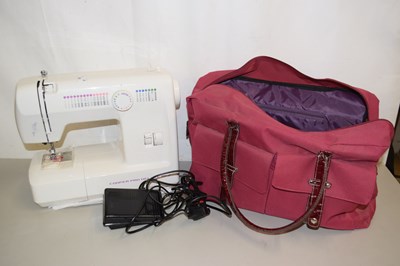 Lot 595 - A sewing machine in bag