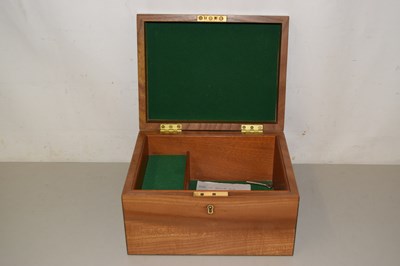 Lot 618 - An English Elm musical jewellery box