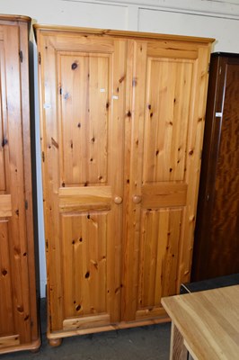 Lot 698 - A double pine wardrobe