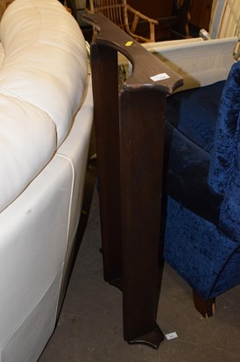 Lot 704 - A wooden wall plate rack