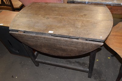 Lot 707 - An oak folding table