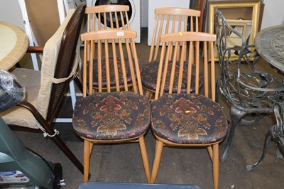 Lot 716 - A set of four spindle back kitchen chairs