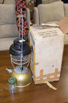 Lot 734 - A boxed tilley lamp