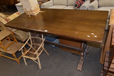 Lot 735 - A small stained pine dining table