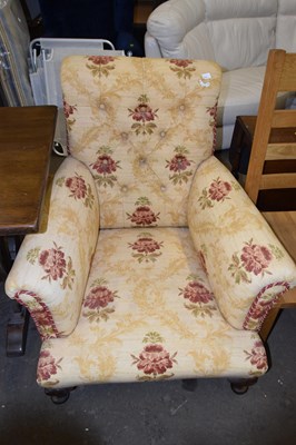 Lot 751 - A floral button back armchair