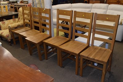 Lot 752 - A set of six oak dining chairs