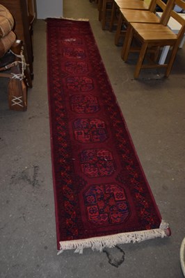 Lot 753 - A modern red floor rug