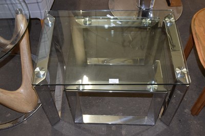 Lot 773 - Pair of glass topped nesting tables