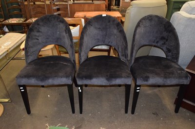 Lot 775 - Three modern black velvet effect dining chairs