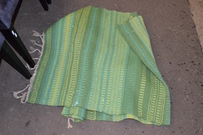 Lot 776 - A modern green floor rug