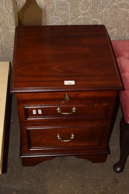 Lot 780 - A dark wood bedside cabinet