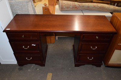 Lot 783 - A modern pedestal desk in dark wood
