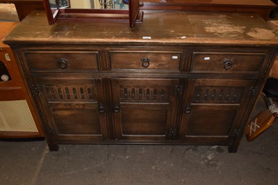Lot 786 - A stained wood three drawer three door sideboard