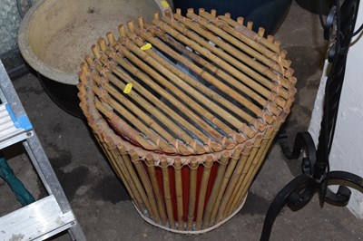 Lot 803 - A bamboo outdoor waste paper basket