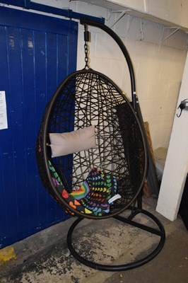 Lot 821 - A egg chair with a pride flag