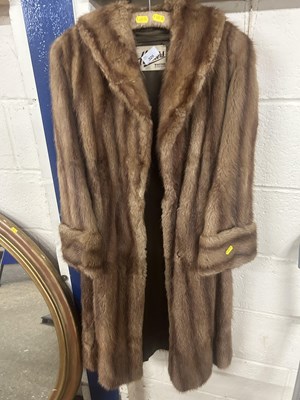 Lot 326 - A fur coat with label for Hunters, Whitton,...