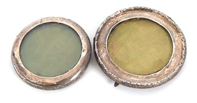 Lot 41 - Two silver circular photograph frames, (both...