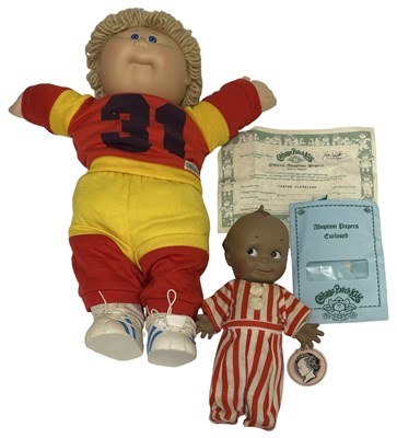 Lot 222 - A pair of retro dolls, to include:  - Cabbage...