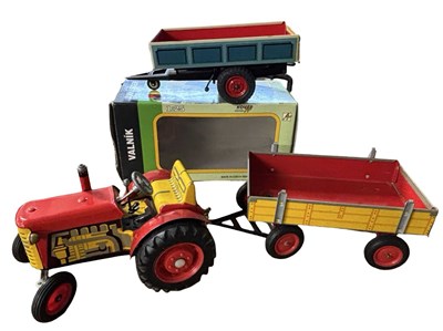 Lot 183 - A tinplate Zetor tractor and trailer model,...