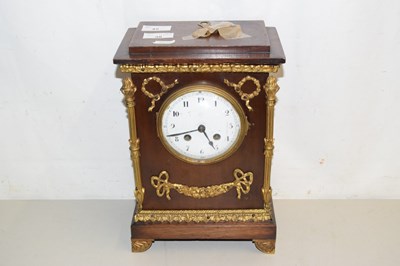 Lot 42 - A mantel clock in Regency style, white enamel...