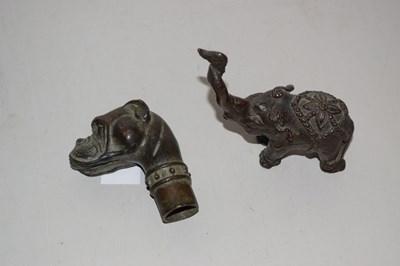 Lot 65 - Bronze walking stick finnial in the form of a...