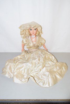 Lot 171 - A vintage plastic bodied doll in flowing dress