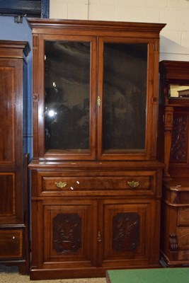 Lot 257 - A late Victorian walnut secretaire bookcase...
