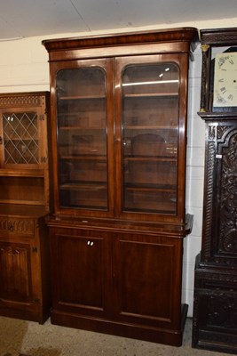 Lot 266 - A Victorian mahogany bookcase cabinet with...