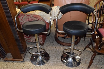 Lot 305 - A pair of metal framed bar stools