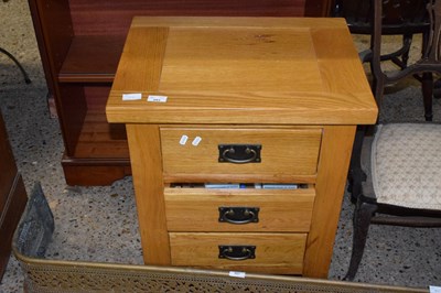 Lot 313 - A modern oak bedside cabinet