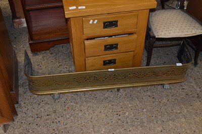 Lot 316 - A brass fire fender