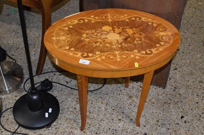 Lot 343 - A modern inlaid oval sewing table with musical...